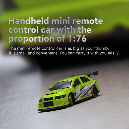 Turbo Racing C66 1/76 scale 2WD drift car on a blurred background