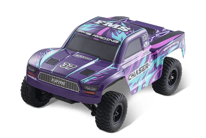 Purple and black FMS FSC24 Chaser 1/24 RC truck – front 3/4 view, grille, wing, drift tires