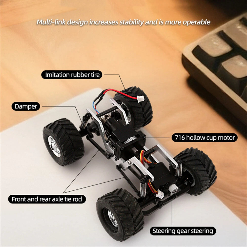 JIABAILE 3601/3602 1/36 scale 4WD RC rock crawler, top view of chassis, brushed motor, suspension arms, steering servo, and compact micro frame