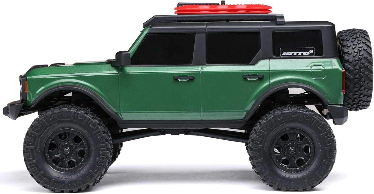 Side profile of Axial SCX24 Ford Bronco 4WD RC mini rock crawler showing body and wheel stance