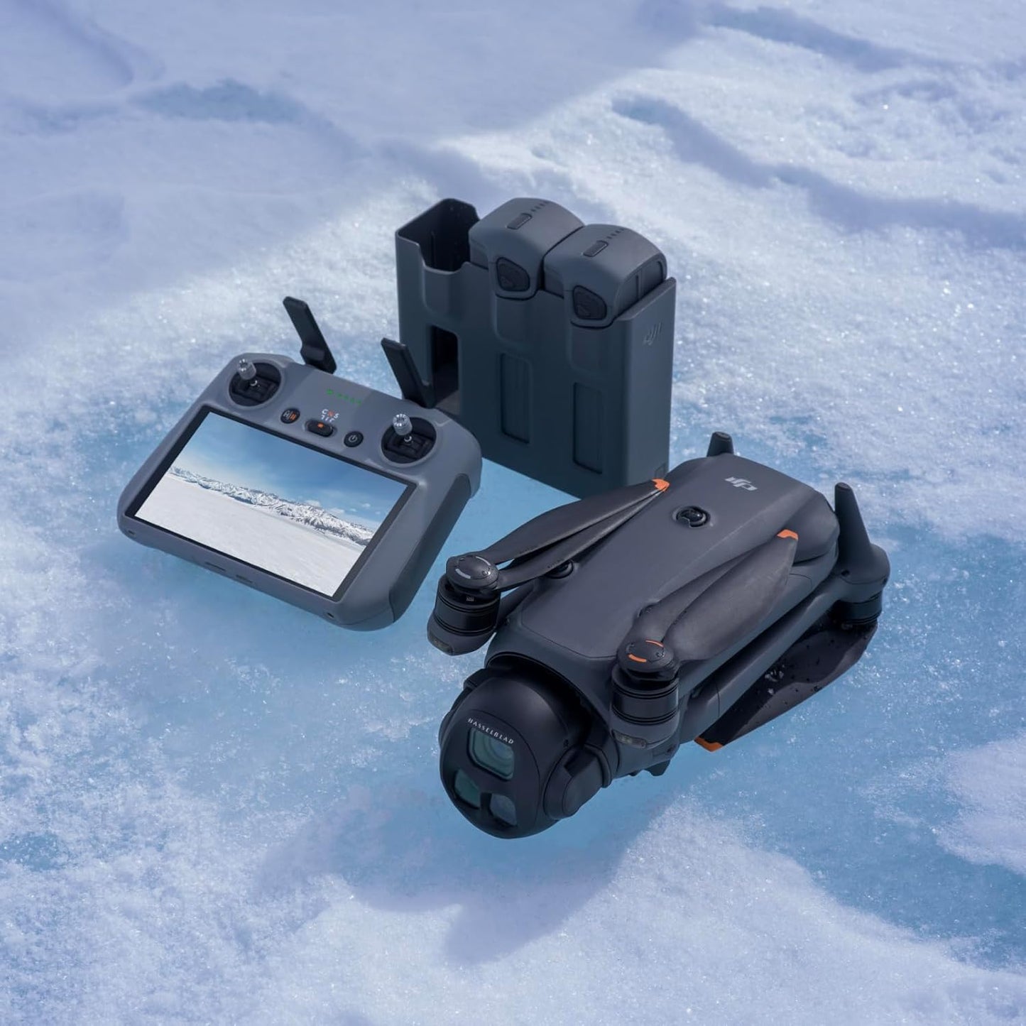 DJI Mavic 4 Pro Fly More Combo and controller set on a snowy surface