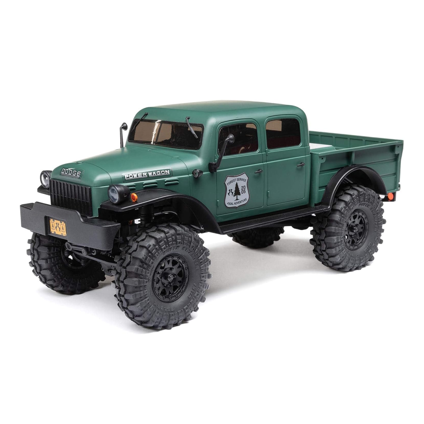 Axial SCX24 Dodge Power Wagon 1/24 4WD RTR mini rock crawler – front 3/4 view in green body showing classic grille, headlights, beadlock wheels, soft tires