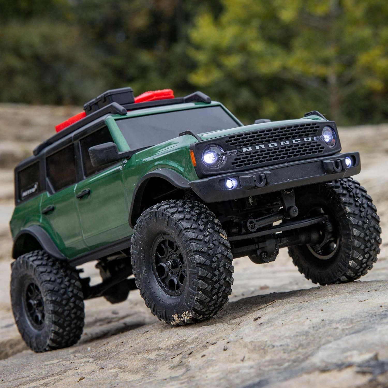 Axial SCX24 Ford Bronco RC crawler climbing rocky terrain