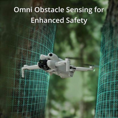 DJI Mini 4 Pro Fly More Combo drone with omni obstacle sensing technology in a forest setting