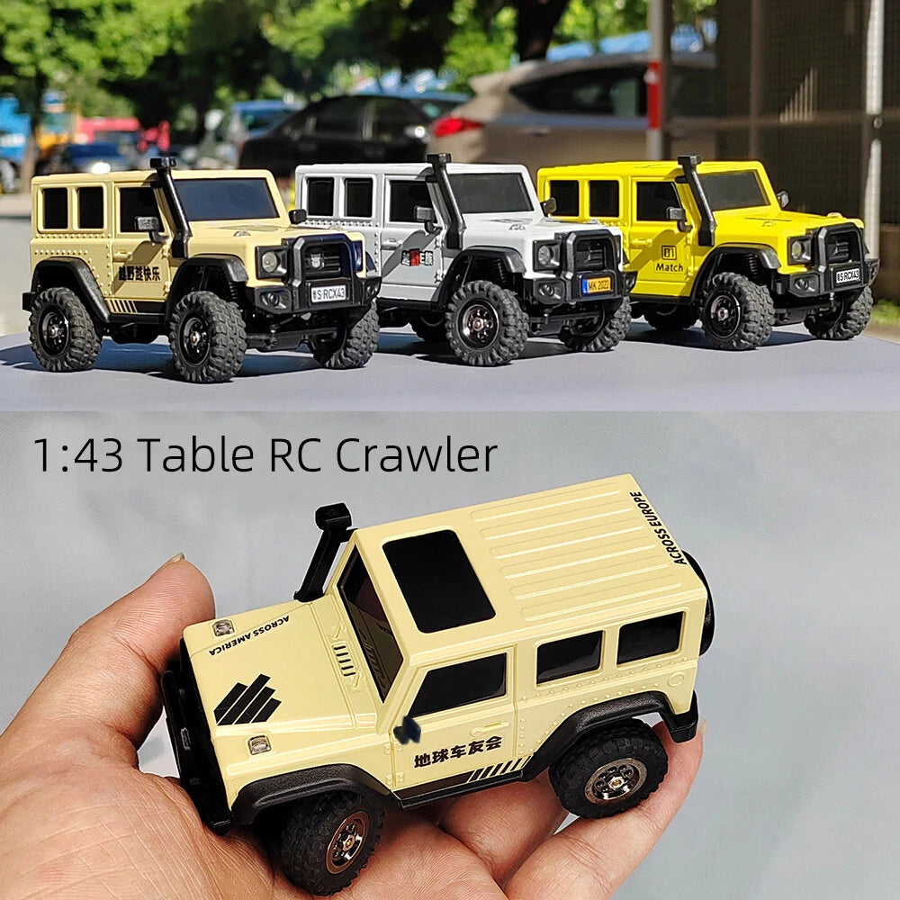 Collection of 1/43 scale 4WD Ready-to-Run mini RC rock crawlers, including a crawler held in a hand.