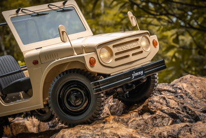 1/6 scale Suzuki Jimny 4WD RTR off-road truck climbing rocky terrain