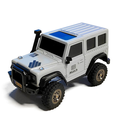 White LDARC X43 mini RC rock crawler front three-quarter view